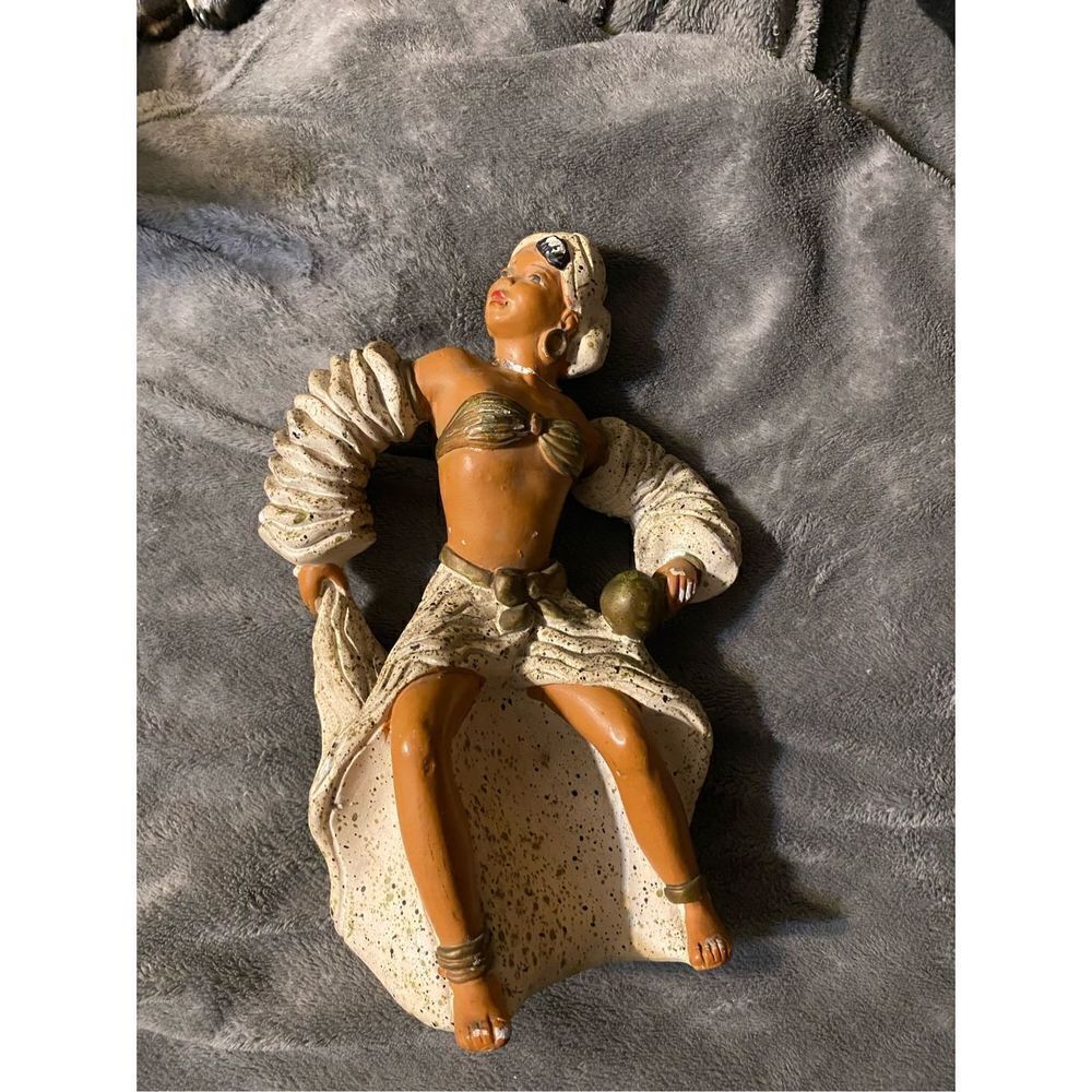Universal sanctuary chalk ware rumba dancer statue